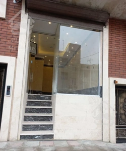 فروش یک باب تجاری و یک واحد مسکونی