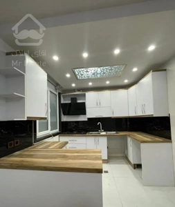 ۵۵ متر پارکینگ دار خوش نقشه  نما تراورتن شهرک نفت