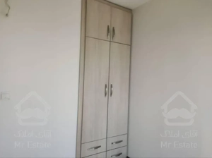 اجاره آپارتمان ۲ خواب خوش نقشه دیزاین شده غرق نور دارای چشم انداز ابدی برجهای ارکیده دریاچه چیتگر