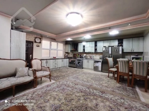 فروش آپارتمان 100متری سالن پرده خور تراورتن طبقه 5 سازمان برنامه جنوبی