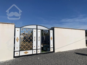 سرخرود /باغچه نهال کاری شده /دیوار کشی شده