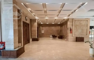 ١١٤ متری واقع در برج با مشاعات ابی و باشگاه ورزشی