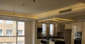 دو خوابه 105متری/واقع در توحیدی راد/جنوبی درب حیاط