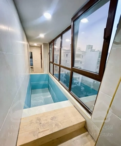 آپارتمان ۲۰۰متر مدرس/سه نبش*جلال/۳مستر-استخر