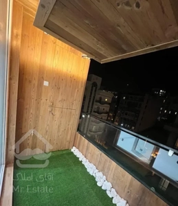 شهرک لاله۷۵م/1خ/سازه ای باذوق ایرانی دربام تهران