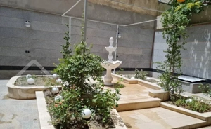 آپارتمان همکف ۹۰متری شیک با۱۰۰متر حیاط اختصاصی