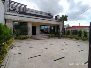 ویلا تریبلکس طراحی ژورنالی با دو روفگاردن ویو ابدی