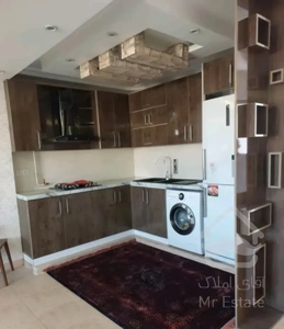 اپارتمان دوخوابه طبقه دوم  با پارکینگ و انباری