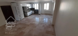 ۷۵ متر فول امکانات تراورتن رو به آفتاب بلوار لاله