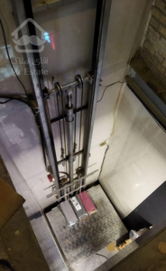 تعمیر انواع بالابر پله برقی دربهای صنعتی