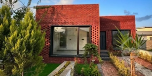 ویلا باغچه کلیدنخورده 154 متری شهرکی سند تک‌برگ