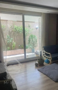 برخیابان صائب هم کف با حیاط سه طرف نور185متر